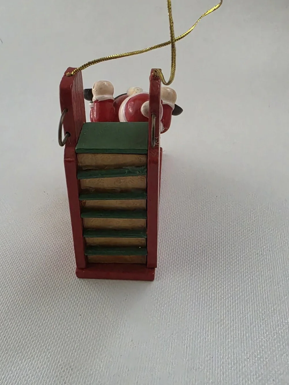Santa on Playground Slide Wooden Christmas Ornament Whimsical Holiday Decor